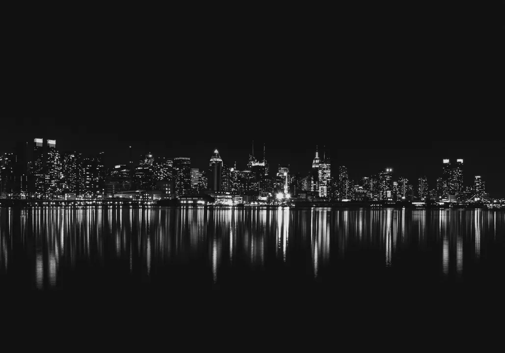 City skyline at night in black and white