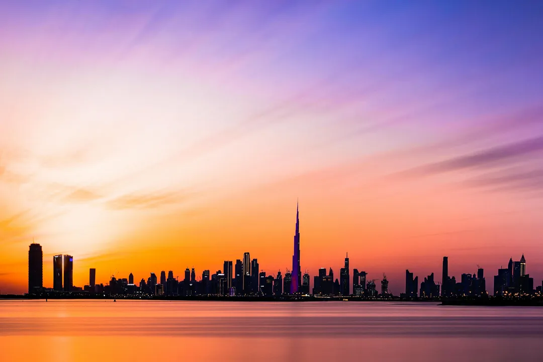 City skyline at sunset with Burj Khalifa