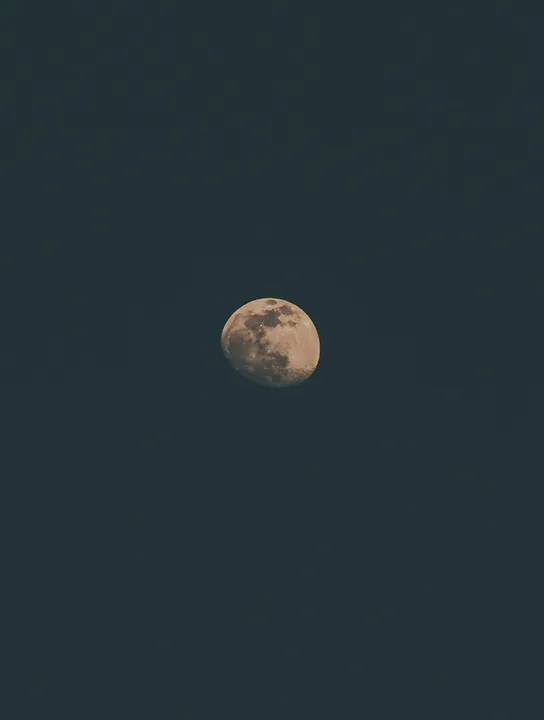 Full moon in dark sky